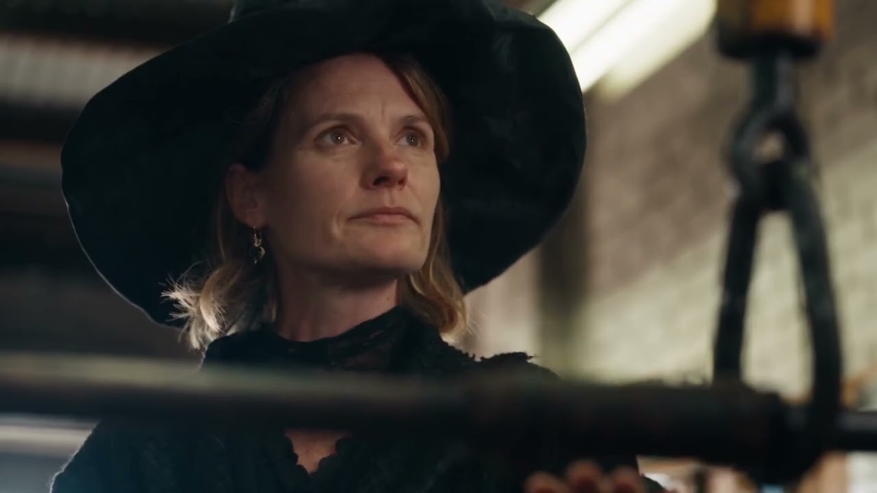 Still from The Courtesy Broom — A witch takes her broom in for a service. The mechanic says it needs more work.